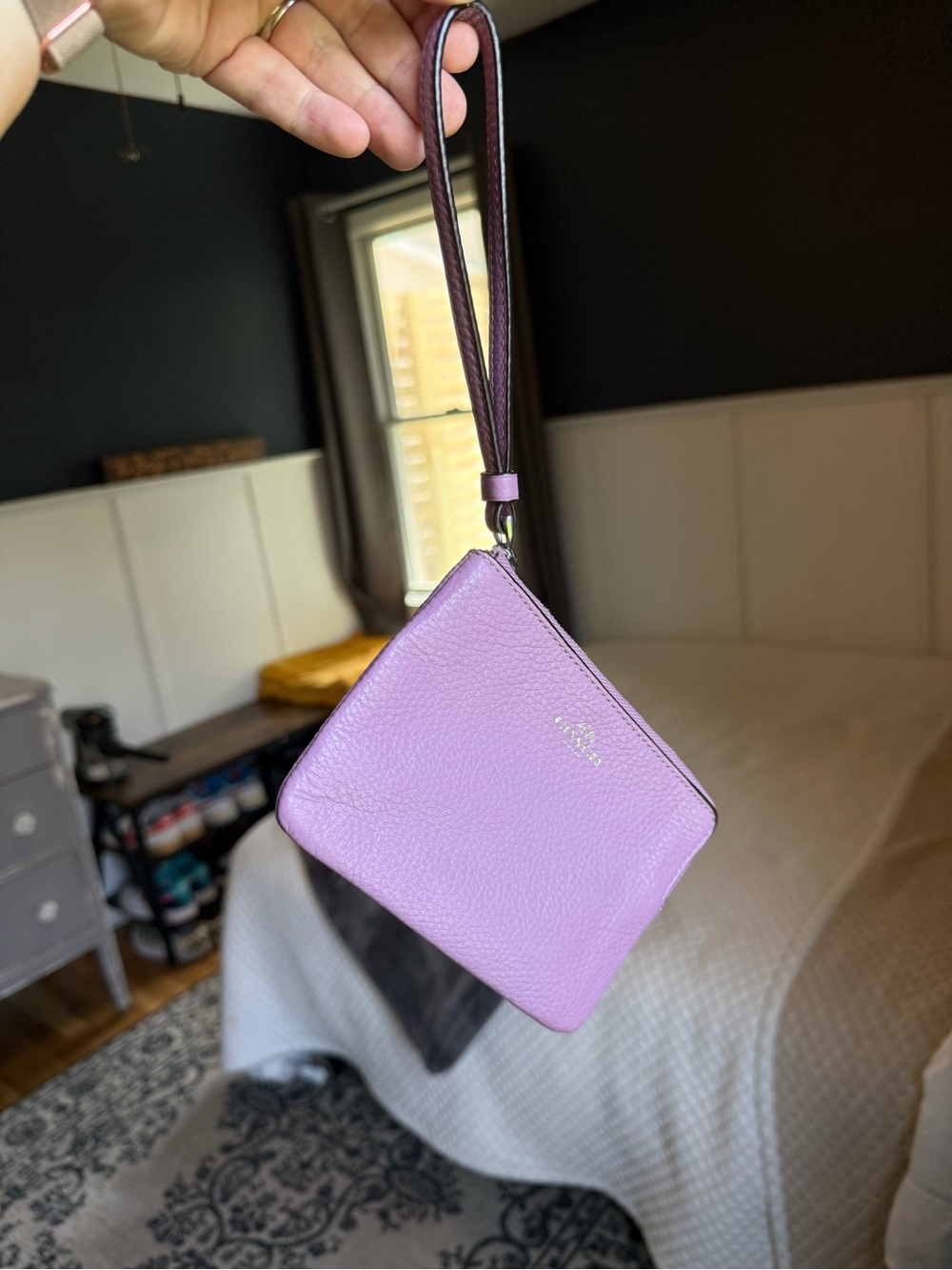COACH wristlet.